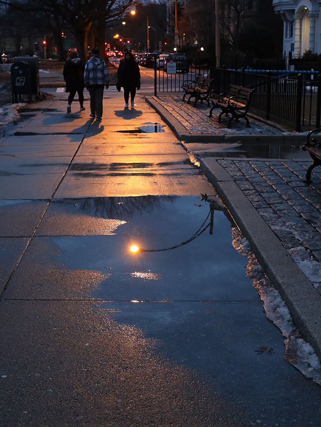 Reflected Streetlight in Winter Puddle.